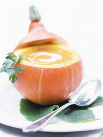 Pumpkin Soup with Creme Fraiche in Hollowed-Out Pumpkin