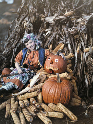 Girl Poses with Corn and Pumpkins During Corn Harvest in Virginia